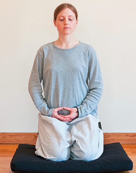 Sitting on a meditation stool
